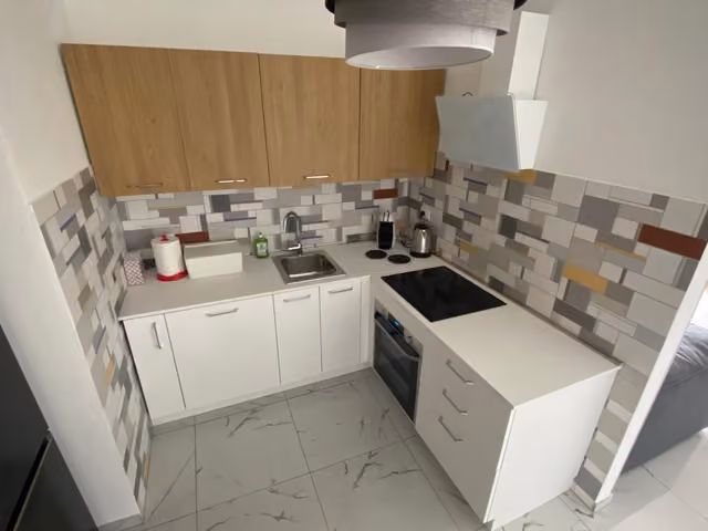 Cucina o angolo cottura attrezzato dell'appartamento